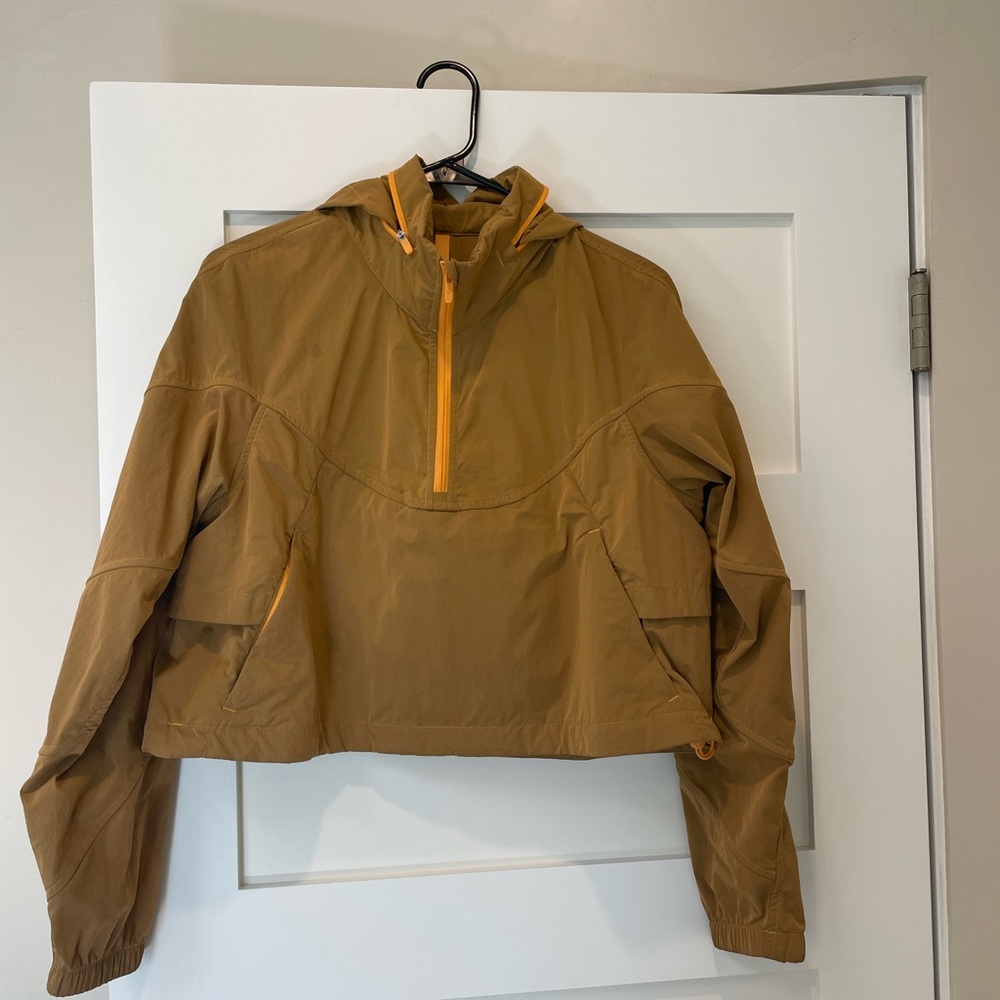 Lululemon cropped foldable rain coat.